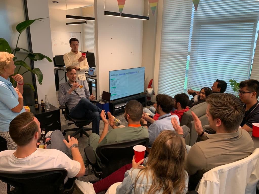 Lizard Global team in a meeting