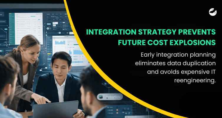 Business team analyzing dashboards and integration workflows on a laptop, illustrating strategic system integration to prevent future IT cost overruns.