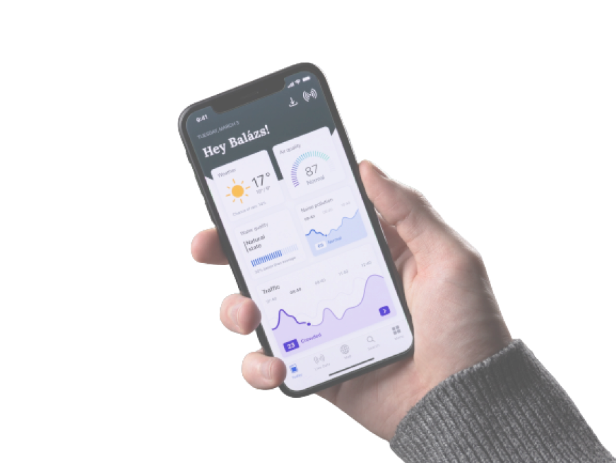 A picture of a person holding a phone that shows data analytics